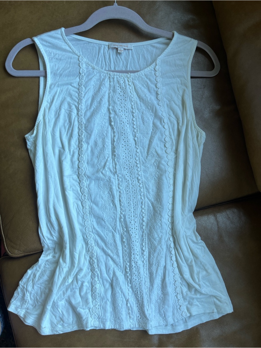 Classy, detailed, beautiful, creamy white tank for all occasions.. never worn